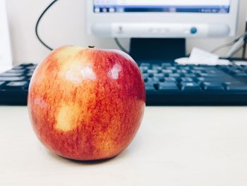 Close-up of apple on table