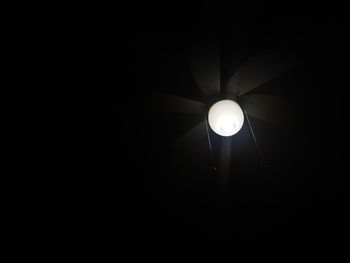 Low angle view of illuminated lamp post