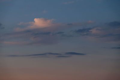 Low angle view of clouds in sky during sunset