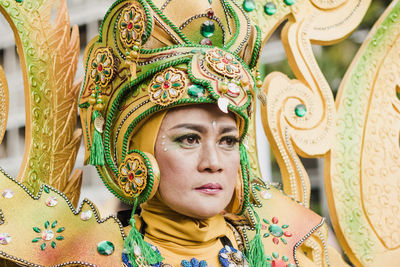 Close-up of woman wearing costume in traditional festival