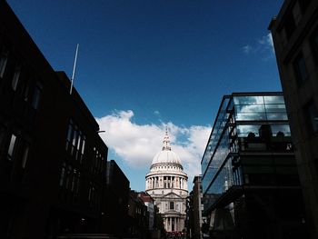 Low angle view of building against blue sky