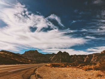 Highway passing through desert and mountains in nevada