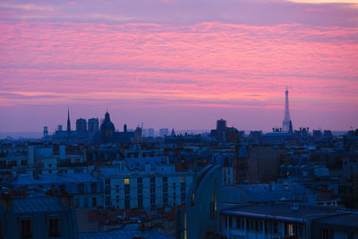 Cityscape against sky during sunset