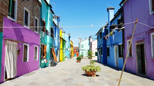 Narrow alley with buildings in background