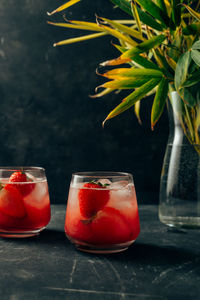 Close-up of red drink on table