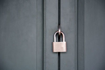 Close-up of padlock on door