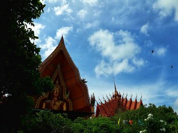 Low angle view of statue against sky