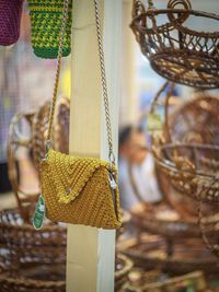 Close-up of purse hanging at store for sale