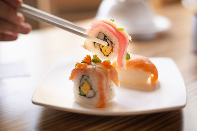 Close-up of sushi served on table