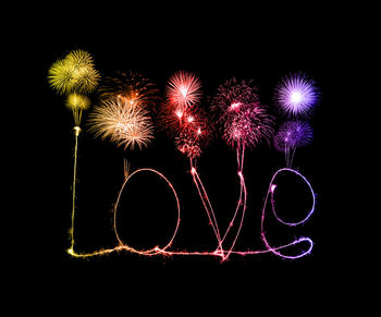 Firework display at night