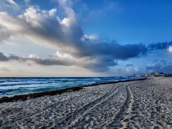 Scenic view of beach against sky