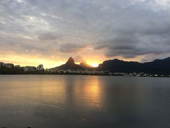 Scenic view of lake against sky during sunset