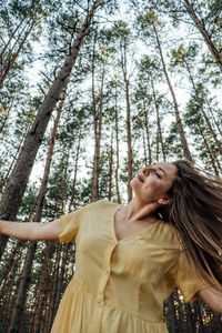 Midsummer solstice ritual. woman with long hair dance on nature background