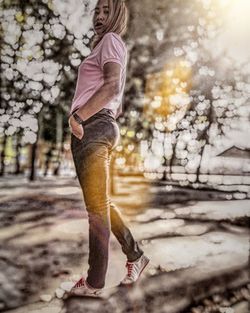 Low section of woman running