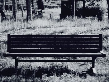 Empty bench on field