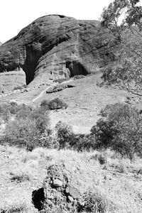 View of rock formation on land against sky