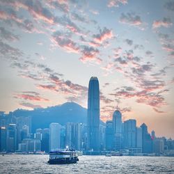 Cityscape against sky during sunset