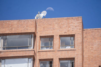 Low angle view of building against clear sky