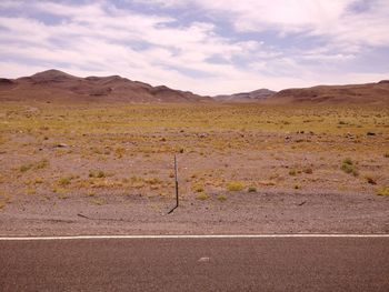 Scenic view of desert against sky