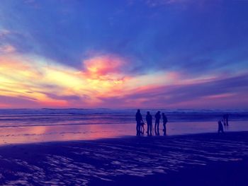 Scenic view of sea at sunset