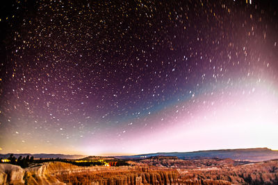 Scenic view of star field against sky at night