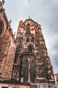 Low angle view of historic building against sky