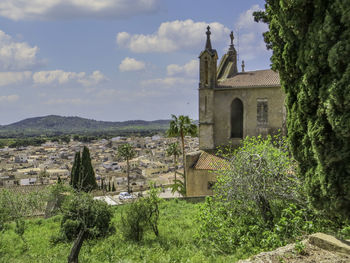 Historic building against sky in artà, spain