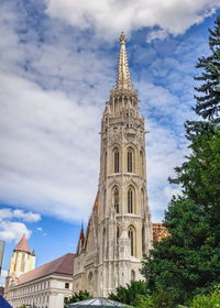 Church of the assumption of the buda castle in budapest, hungary, on a sunny summer morning