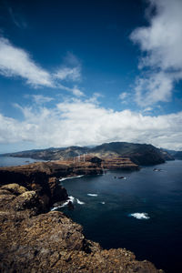 Scenic view of bay against sky