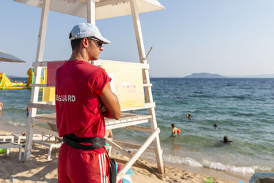 Lifeguard on lagomandra beach to ensure safety on the beach. bathing season in vacation