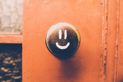 Close-up of smile face on doorknob