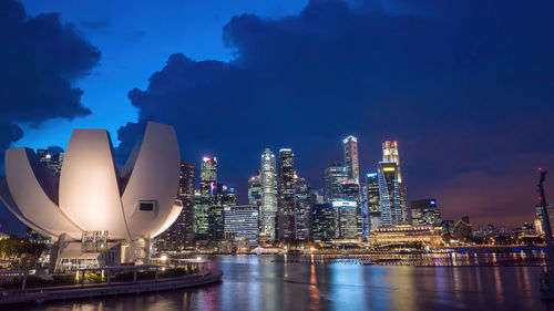 Illuminated city at night,marina bay sand singapore