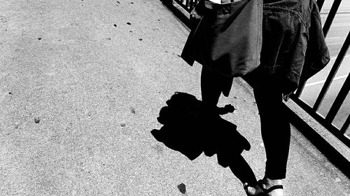 Shadow of woman on wall