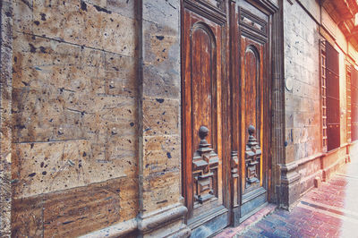 Closed wooden door of building