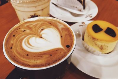 High angle view of coffee cup on table