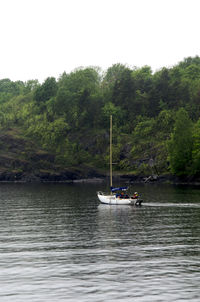 Boat sailing in sea