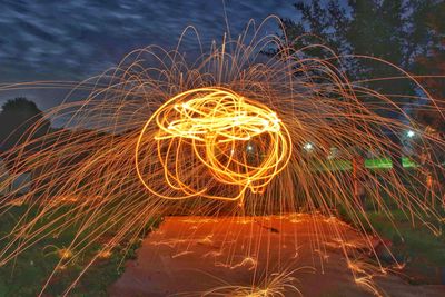 Light trails in sky at night