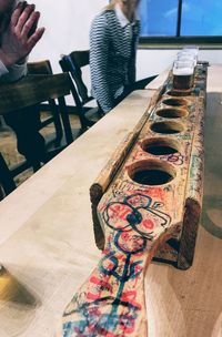 Midsection of man holding table