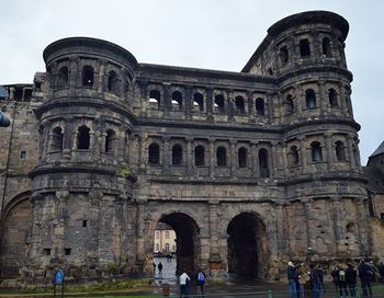 Tourists in front of historical building