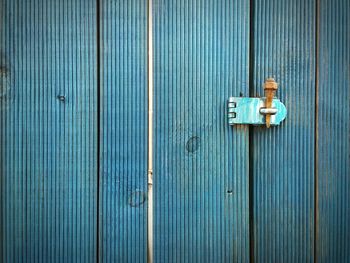 Full frame of blue wooden door