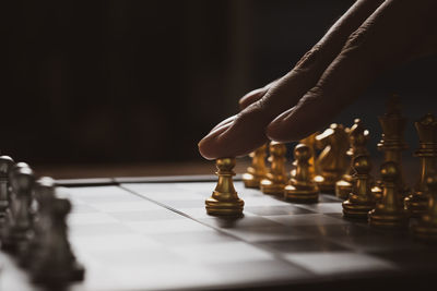 Low angle view of chess playing on table