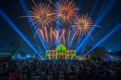 Firework display at night