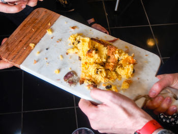 Close-up of person holding food