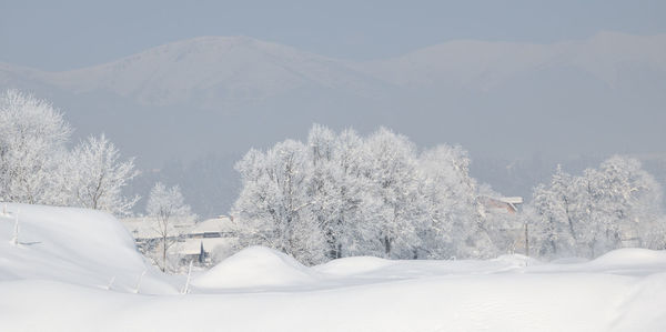 Snowcapped mountains against sky