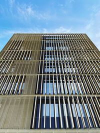 Low angle view of modern building against sky