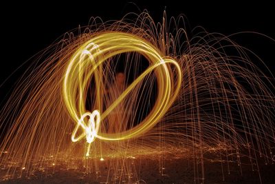 Light painting of firework display at night