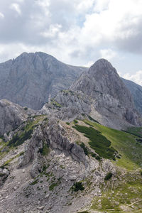 Scenic view of landscape and mountains against sky