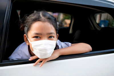 Portrait of boy in car