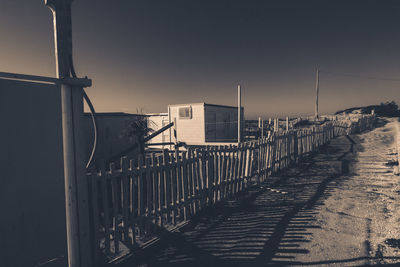 Panoramic shot of buildings against clear sky