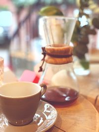 Close-up of coffee cup on table